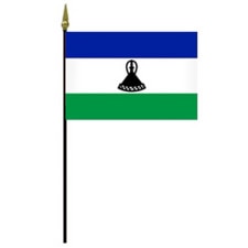 Lesotho national flag on pole
