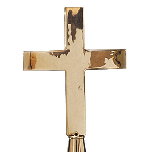 gold cross on display stand