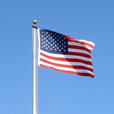 American flag waving in sky