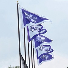 HPU flags waving on flag poles