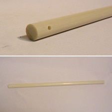 round wooden stick with hole