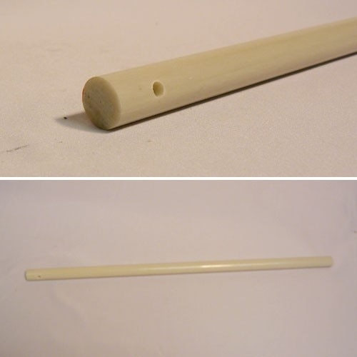 round wooden stick with hole