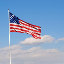 American flag waving in sky